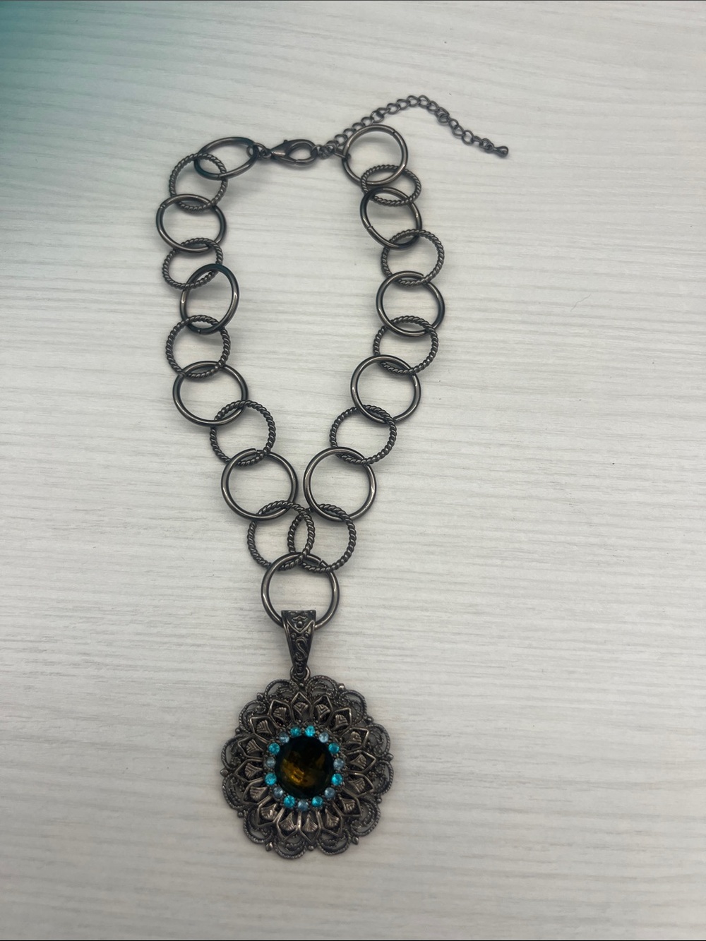 Vintage-Inspired Black Metal Necklace with Blue Accent Pendant